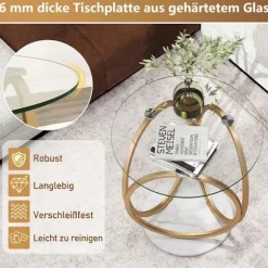 Rundt sofabord i glas med guldmetalramme