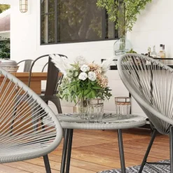 Udendørs terrassesæt – 2 rattanstole, glasbord, stålramme
